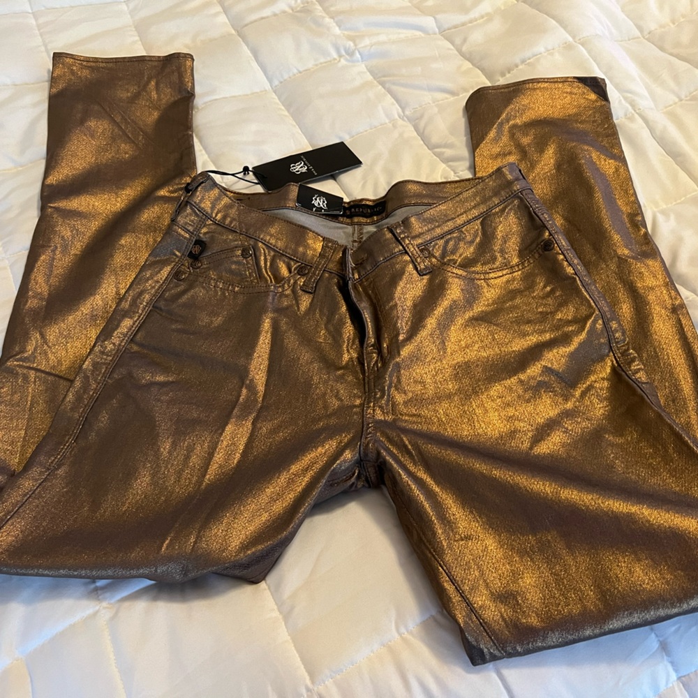Gold shimmery jeans stretch.